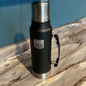 Stanley 1.1 quart Black thermos in good shape has a small scuff here and There